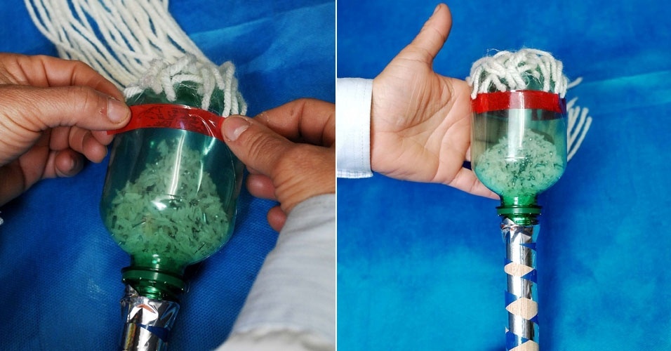 Para dar acabamento ao "cabelo" do boneco que enfeitará a maraca, passe fita adesiva, na cor que quiser, ao redor da "cabeça" - Reinaldo Canato/UOL