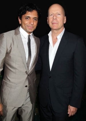 O diretor M. Night Shyamalan e o ator Bruce Willis - Getty Images