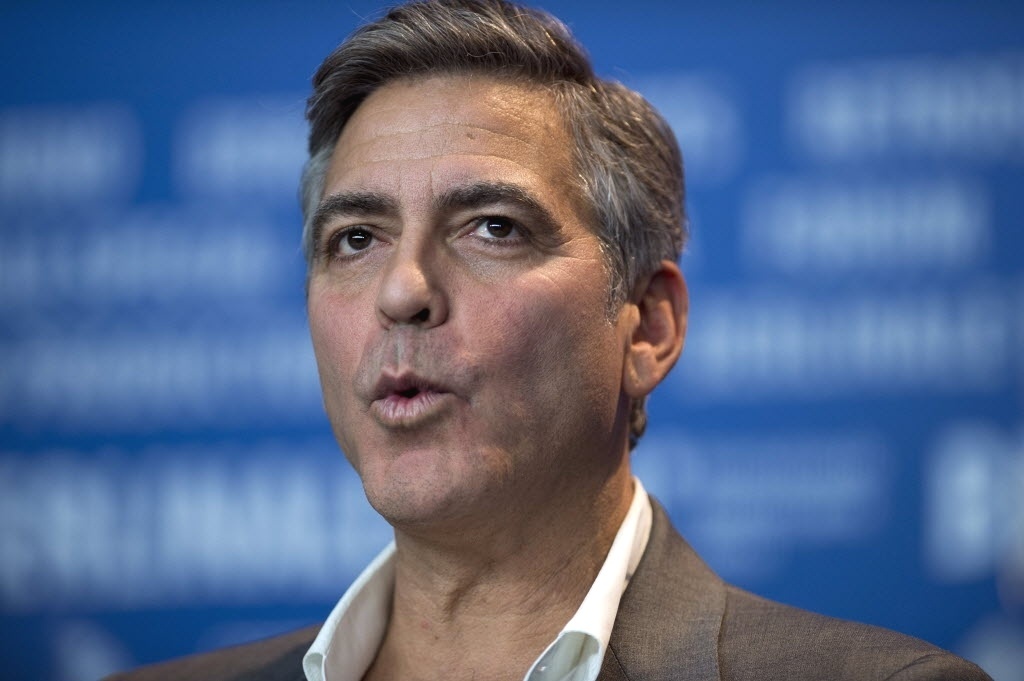 08.fev.2014 - George Clooney promove o filme "Caçadores de Obras-Primas" no Festival de Berlim - AFP