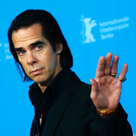 O músico e ator Nick Cave durante sessão de fotos em 2014 - Thomas Peter/Reuters