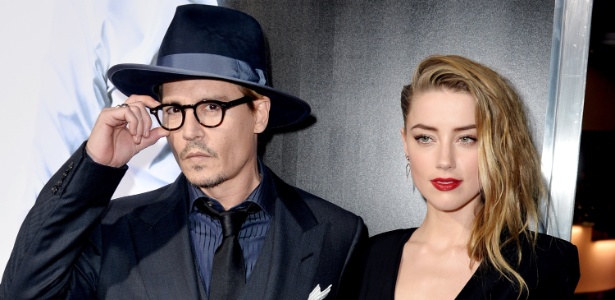 1Johnny Depp e Amber Heard posam abraçados na première de "3 Days to Kill", em Hollywood