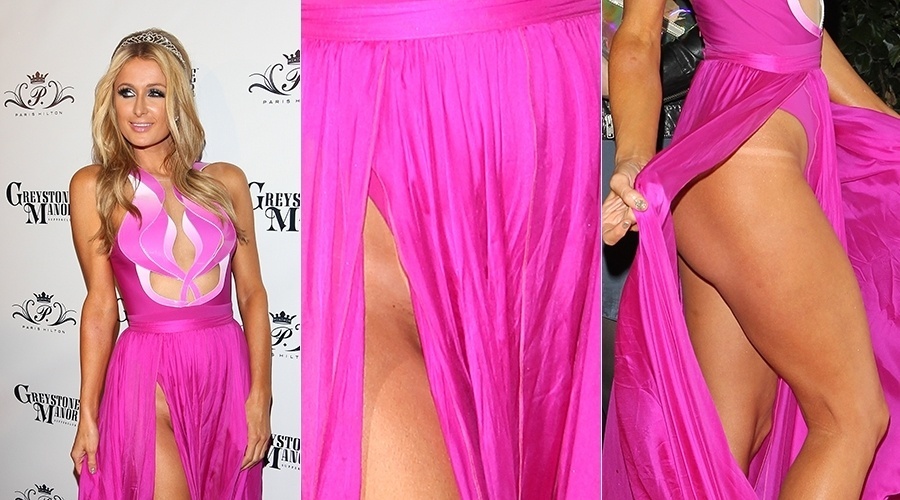 17.fev.2014 - Paris Hilton escolheu um look bem sexy para dar início as comemorações dos seus 33 anos. A patricinha escolheu um vestido rosa pink, com decote e fenda para ir a uma boate em Los Angeles. Paris não se intimidou ao revelar que estava sem calcinha