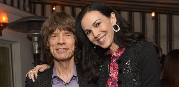 19.nov.2013 - Mick Jagger e L"Wren Scott em festa da Banana Republic, em Los Angeles - Charley Gallay/Getty Images for Banana Republic