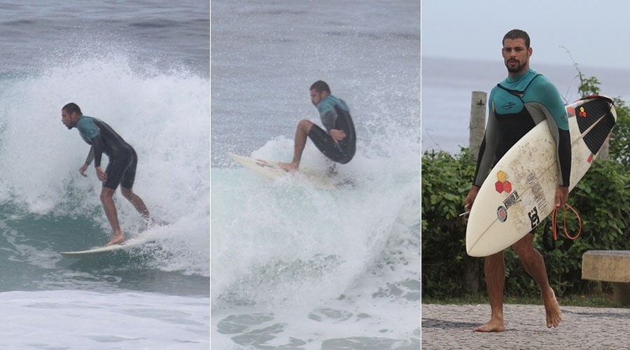 25.mar.2014 - Cauã Reymond surfa na praia da Barra