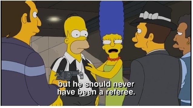 Para evitar que o marido seja morto, Marge perde em português, no melhor estilo gringa, para que não matem Homer