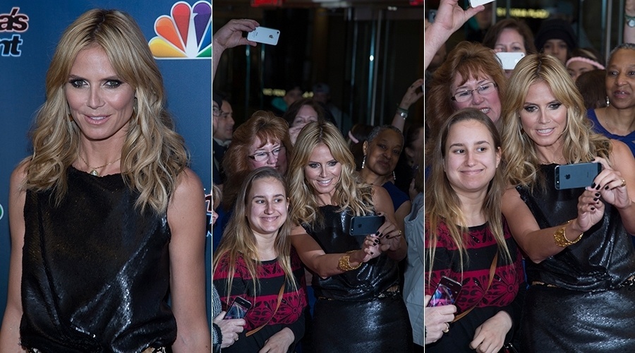 4.abr.2014 - A ex-modelo Heidi Klum fez a alegria de uma fã durante première da nova temporada do programa "America's Got Talent", em Nova York. Heidi pegou o celular da jovem e fez uma foto selfie