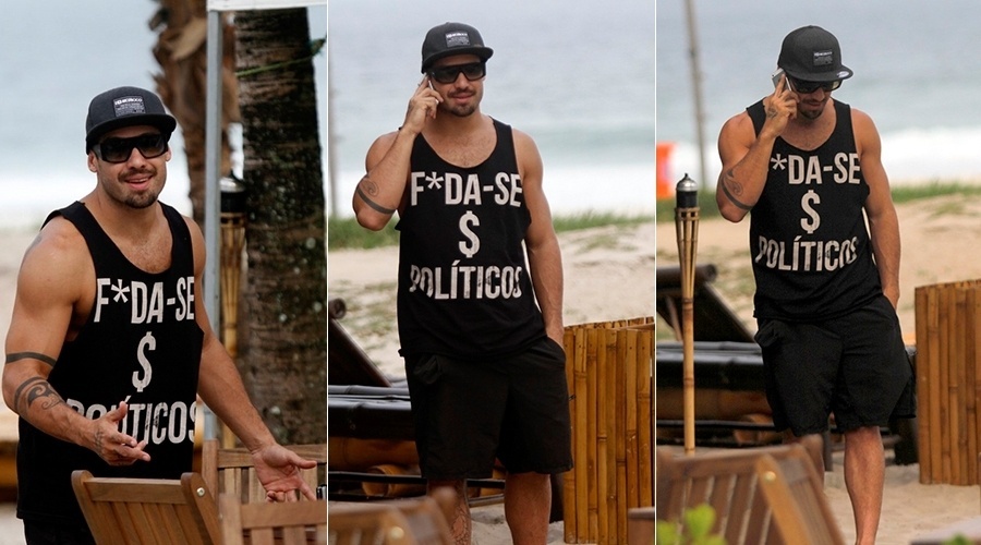 9.abr.2014 - O ex-BBB Yuri escolheu uma camiseta como forma de protestas contra os políticos. Em passeio pela praia da Barra da Tijuca, na zona oeste do Rio, o modelo e lutador exibiu a camiseta com a frase "F***-se Políticos"