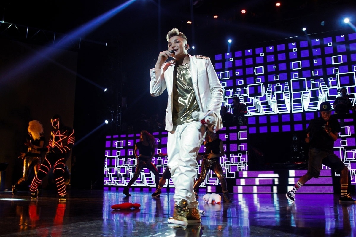 13.abril.2014 - MC Gui grava o seu primeiro DVD em São Paulo. Aos 15 anos, o menino chamado Guilherme Kaue Castanheira Alves faz sucesso com o chamado funk ostentação. O show cheio de efeitos especiais aconteceu na casa de espetáculos Citibank Hall, na noite deste domingo (13) - Manuela Scarpa/Photo Rio News