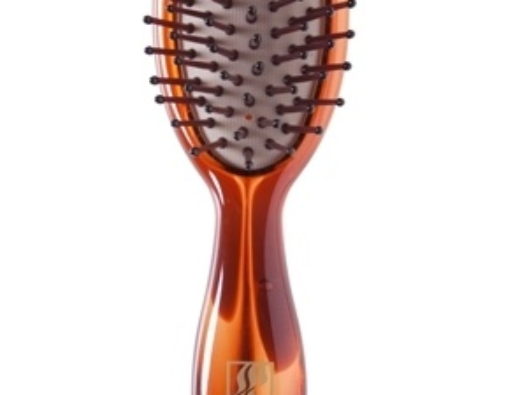 Escova Almofadada Pedras Brasileiras, da Marco Boni. Ajuda a desembaraçar e massageia o couro cabeludo. Preço sugerido: R$ 10,80. SAC: (11) 4615-6501. | Preço pesquisado em maio de 2014 e sujeito a alteração - Divulgação