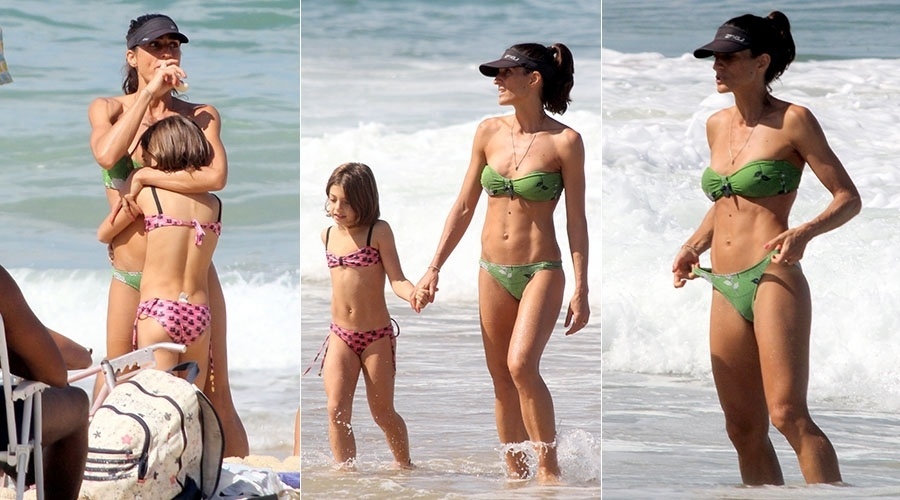 4.mai.2014 - Cynthia Howlett vai com a filha à praia do Leblon