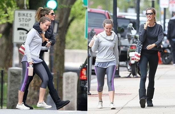 14.mai.2014 - Gisele Bündchen circula com a irmã Patrícia pelas ruas de Boston, Estados Unidos. Empolgada, a top foi vista sorridente enquanto caminhava abraçada à irmã 