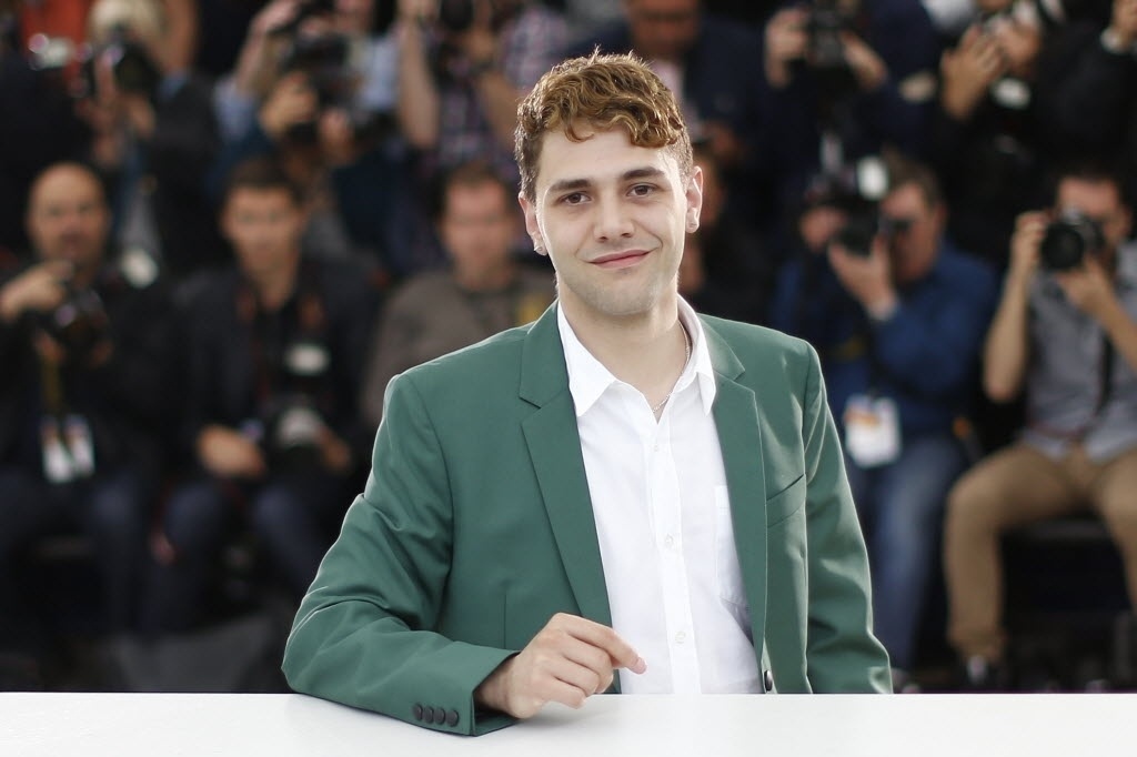 22.mai.2014 - O diretor canadense Xavier Dolan em evento de seu filme "Mommy" - AFP