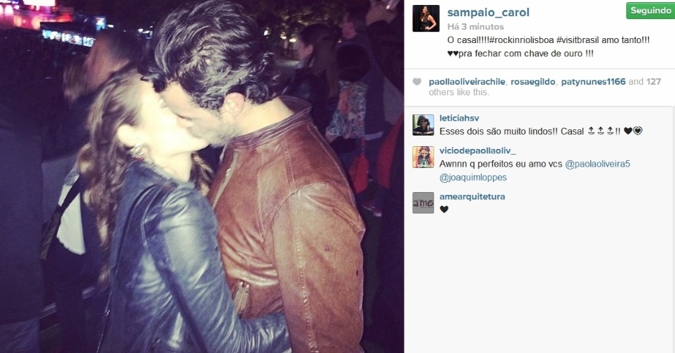 29.mai.2014- Paolla Oliveira e Joaquim Lopes trocam beijos apaixonados no Rock in Rio Lisboa, em Portugal. A foto foi publicada pela promoter carioca Carol Sampaio no Instagram: 