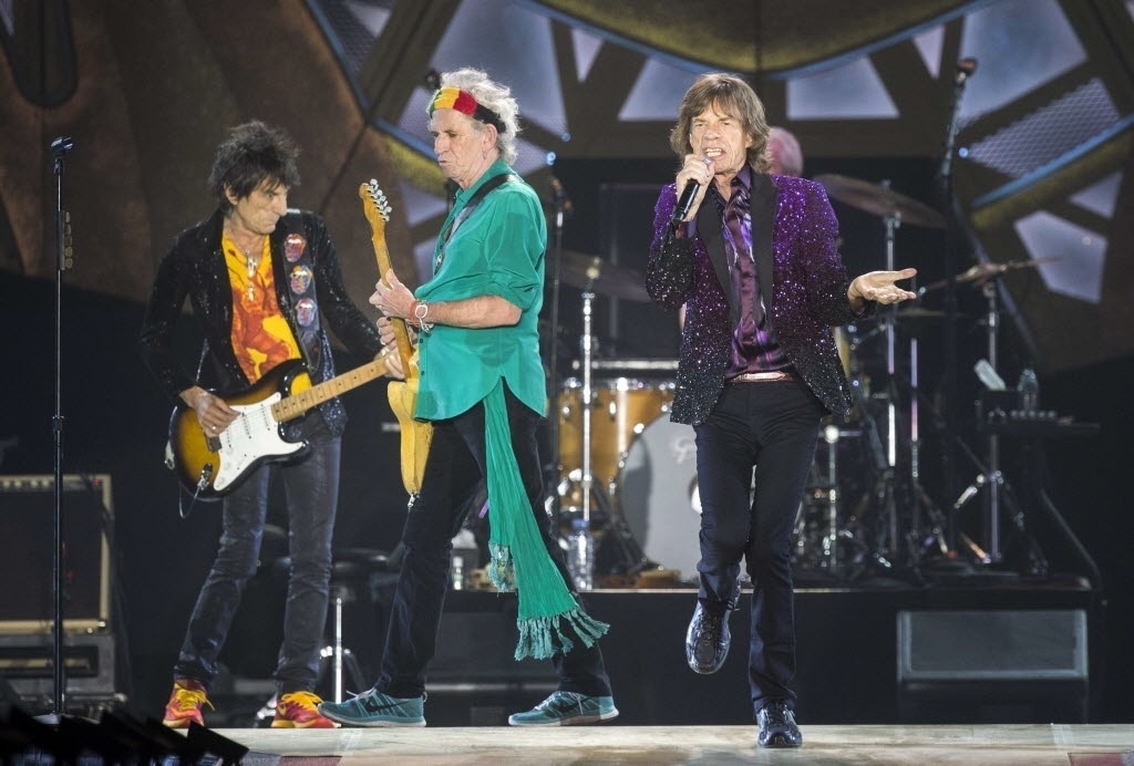 4.jun.2014 - Ronnie Wood, Keith Richards e Mick Jagger durante apresentação dos Rolling Stones no Hayarkon Park em Tel Aviv - AFP