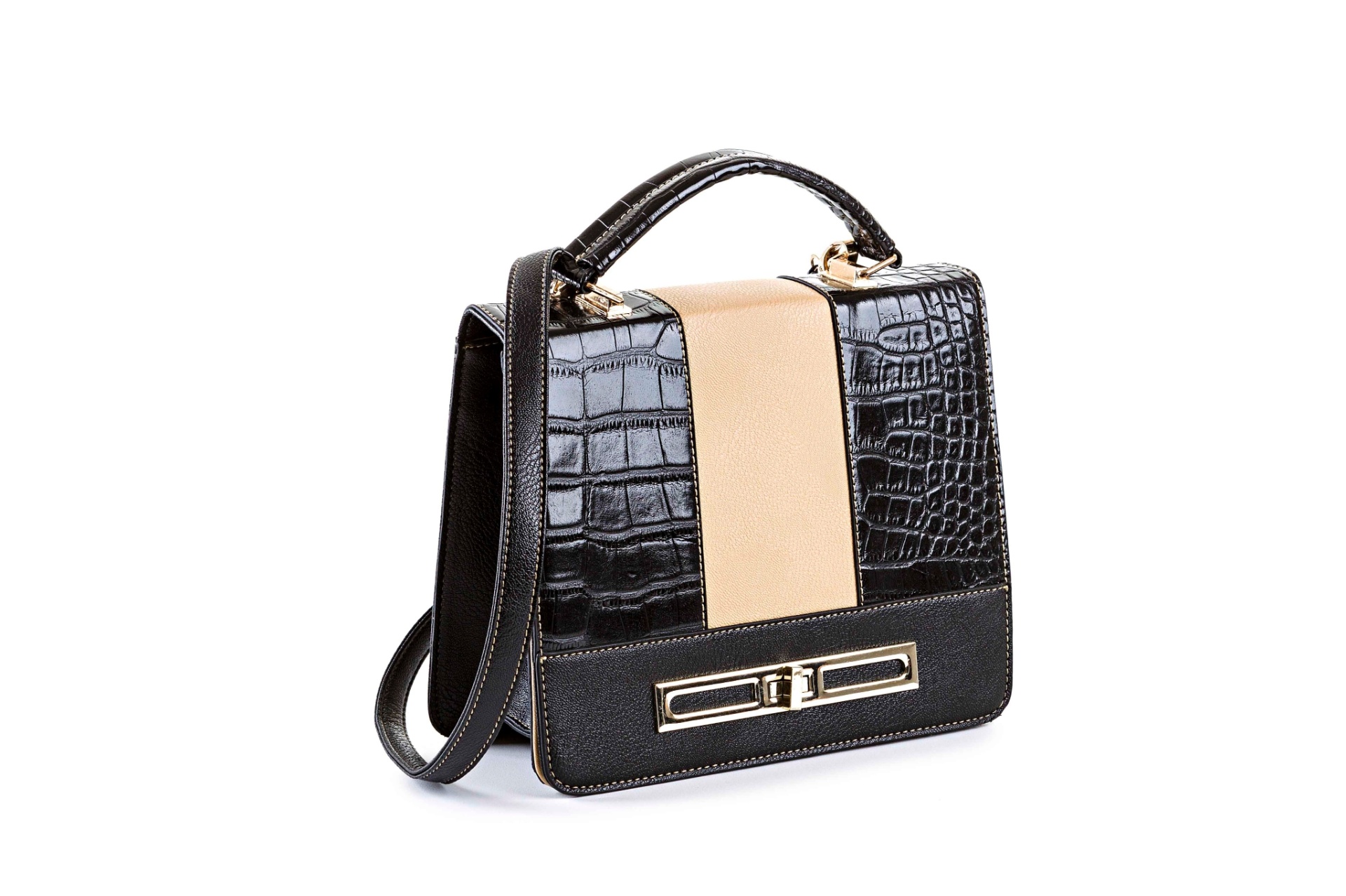 Bolsa em ?couro sintético? (tecido sintético com aparência de couro), da Le Postiche. R$ 139,99. Informações: www.lepostiche.com.br | Preço e disponibilidade pesquisados em maio de 2014 e sujeitos a alterações - Divulgação