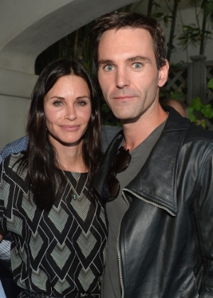 Courtney Cox e o guitarrista da banda Snow Patrol, Johnny McDaid