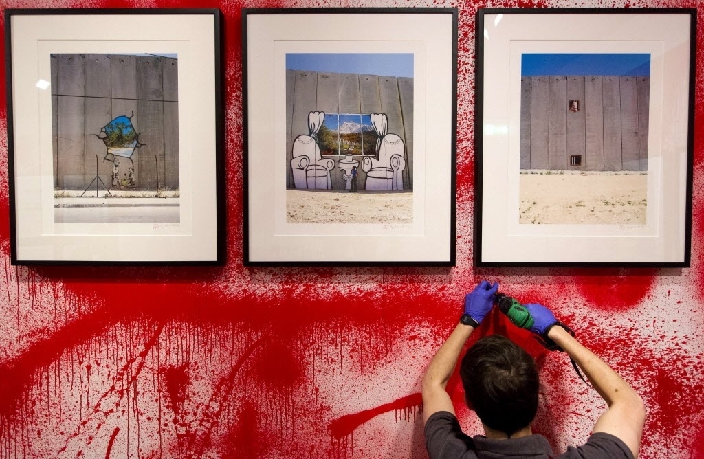 Exposição não-autorizada em Londres reúne 70 obras de Banksy - Justin Tallis/AFP