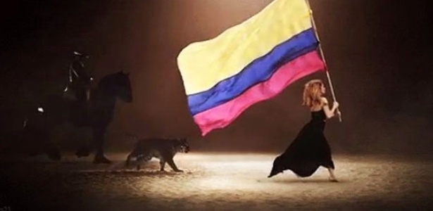 Cantora colocou imagem em que carrega uma bandeira colombiana no clipe "Dare (La La La)".