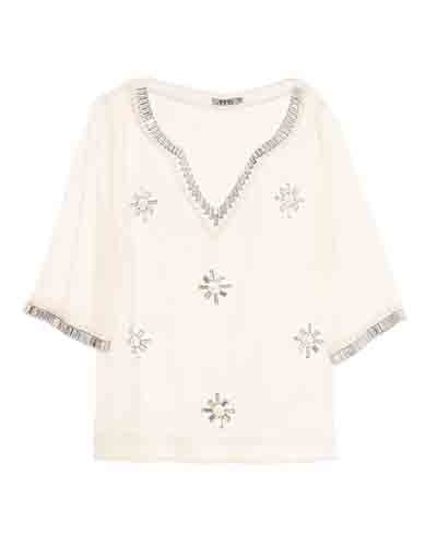 Bata branca de seda bordada, da Ammis, na Modelitto. Preço: R$ 609,80. Informações: www.modelitto.com.br | Preço e disponibilidade pesquisados em julho de 2014 e sujeitos a alterações - Divulgação