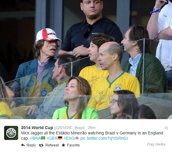 8.jul.2014 - O roqueiro Mick Jagger assistiu ao jogo entre Brasil e Alemanha acompanhado do filho, Lucas, no Mineirão. O adolescente é fruto do relacionamento do cantor com Luciana Gimenez