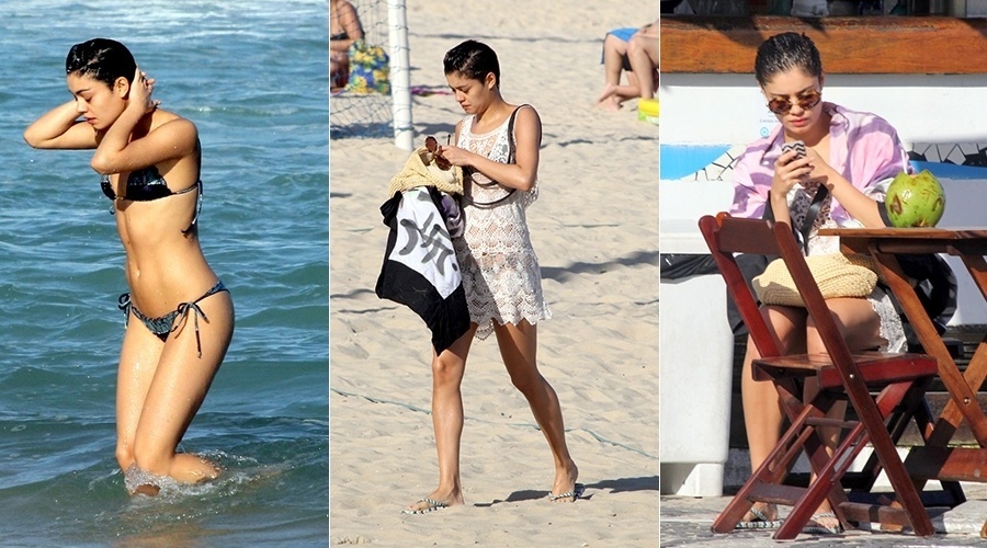 16.jul.2014 - Sophie Charlotte curtiu praia em Ipanema, zona sul do Rio. Sozinha, a atriz mergulhou e tomou água de coco enquanto mexia no celular. Sophie está no ar "O Rebu"