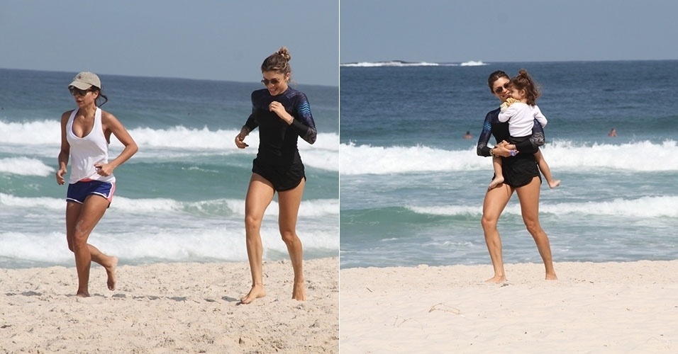 21.jul.2014 - Após correr na praia com Ana Lima, Grazi Massafera pega Sofia no colo
