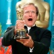 Em 23 de março de 199, Robin Williams festejou o Oscar na categoria de de Melhor Performance de Ator Coadjuvante por seu papel em "Gênio Indoomável" - REUTERS / Sam Mircovich