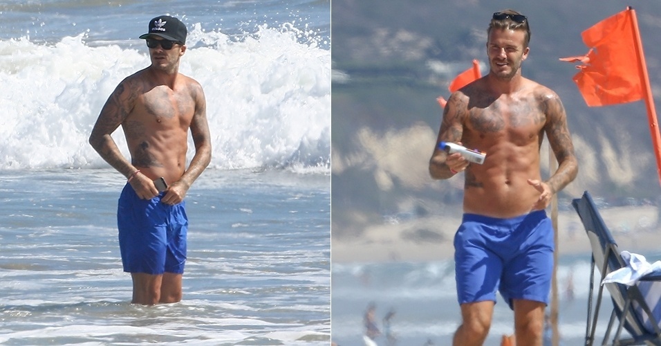 14.ago.2014 - David Beckham aproveita o mar em Malibu, na Califórnia, nos Estados Unidos. O ex-jogador de futebol, que estava acompanhado de amigos, exibia o corpo sarado enquanto relaxava na praia