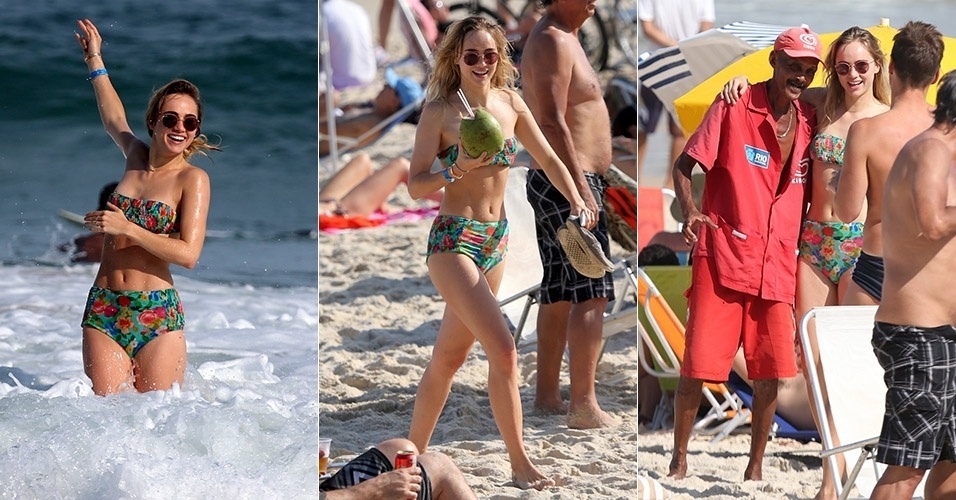 1.set.2014 - Suki Waterhouse, namorada do ator Bradley Cooper, curte manhã de praia em Ipanema, no Rio de Janeiro. A modelo entrou no mar, tomou água de coco e tirou uma foto com um vendedor de sorvetes