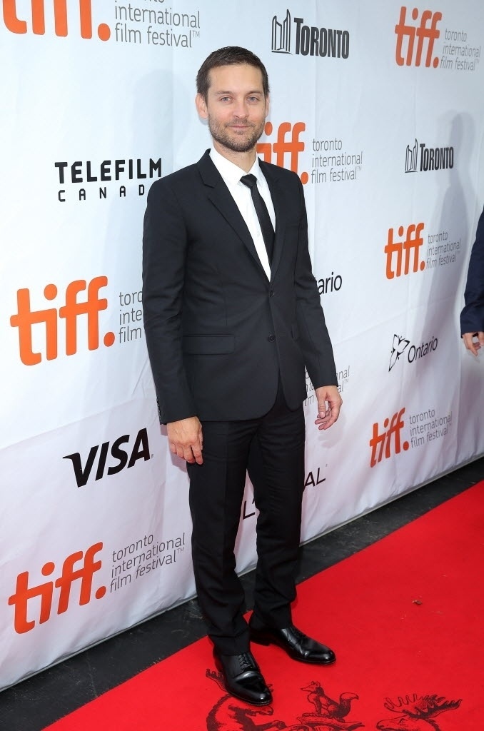 11.set.2014 - O ator e produtor Tobey Maguire vai à exibição do filme "Pawn Sacrifice" no Festival de Toronto - Jemal Countess/Getty Images/AFP