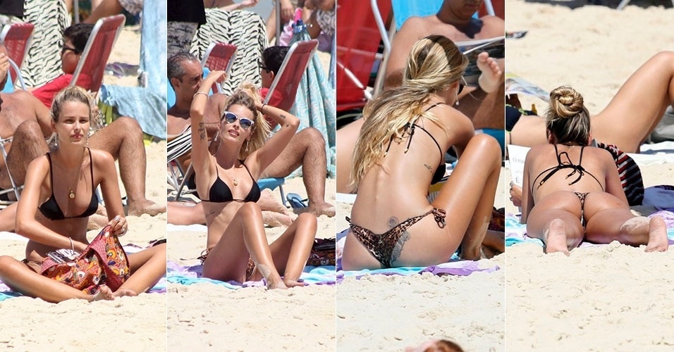 11.out.2014 - Com biquíni de oncinha, Yasmin Brunet curte praia sozinha e exibe suas tatuagens em Ipanema, zona sul do Rio de Janeiro