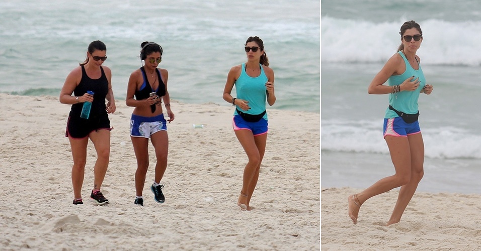 14.out.2014 - Grazi Massafera corre com Ana Lima (centro) e amiga na praia da Barra da Tijuca, no Rio de Janeiro