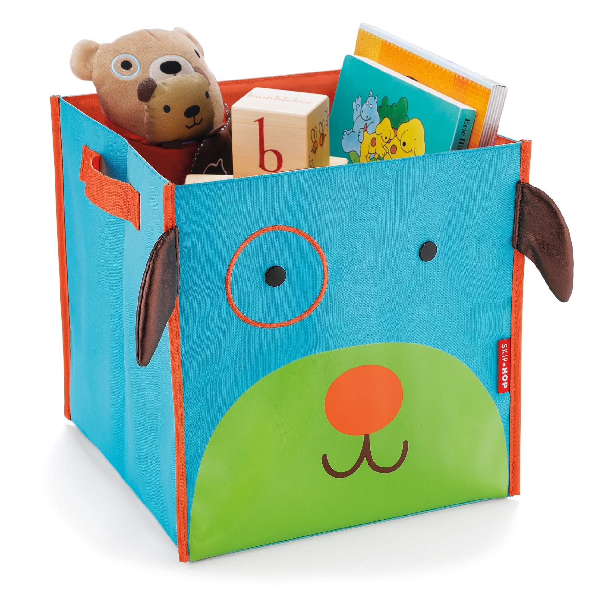 álbum com organizadores para brinquedos | Caixa para guardar brinquedos linha Zoo, modelo cachorro, com 29 cm x 29 cm x 29 cm. Feita de lona de poliéster, é dobrável e possui alças alterais. Da marca americana Skip Hop, vendida na Bebê Boutique (www.bebeboutique.com.br). R$ 120. Preço consultado em dezembro de 2014. Sujeito a alteração - Divulgação