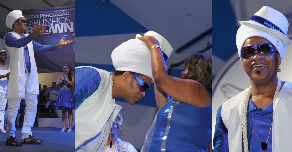 3.dez.2014 - Carlinhos Brown é "coroado", com chapéu, como Rei da Percussão do Carnaval 2015, na quadra da escola de samba Portela, em Madureira, zona norte do Rio de Janeiro, nesta quarta-feira