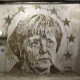 01.set.2012 - Retrato da chanceler alemã Angela Merkel feito pelo artista português Alexandre Farto, conhecido como Vhils, em um muro de Lisboa - EFE