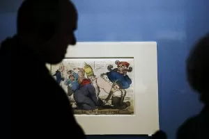 Caricatura que faz parte da exposição "Bonaparte e os britânicos" no Museu Britânico em Londros - ADRIAN DENNIS/AFP