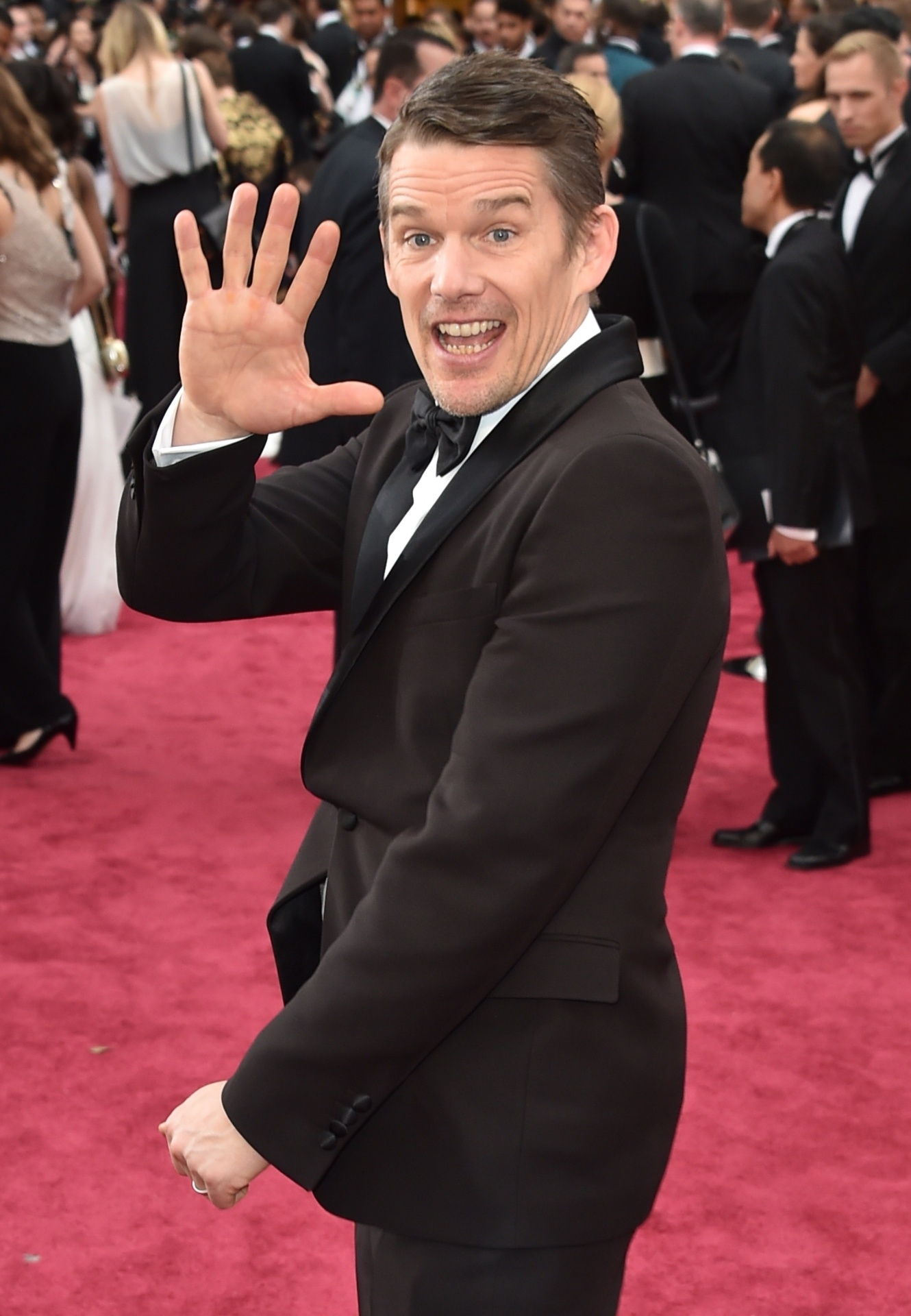 22.fev.2015 - O ator Ethan Hawke, indicado a melhor ator coadjuvante por "Boyhood", na cerimônia do Oscar 2015. O longa ainda concorre nas categorias melhor filme, melhor diretor e melhor roteiro original (Richard Linklater), melhor atriz coadjuvante (Patricia Arquette) e melhor edição (Sandra Adair) - Mladen Antonov/AFP