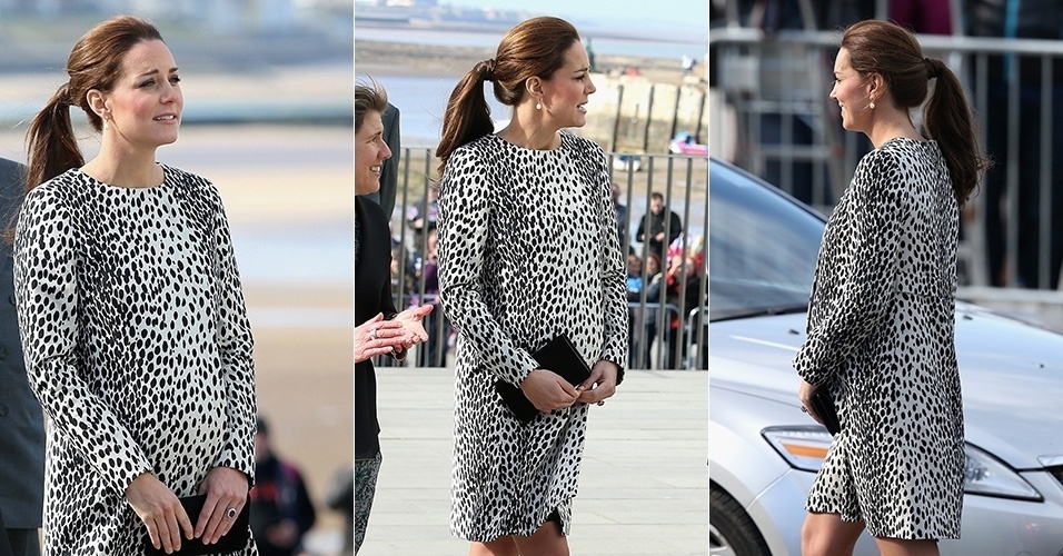 11.mar.2015 - Grávida de oito meses, Kate Middleton exibe barriguinha em vestido animal print durante visita à Turner Contemporary Art Gallery em Margate, na Inglaterra.
