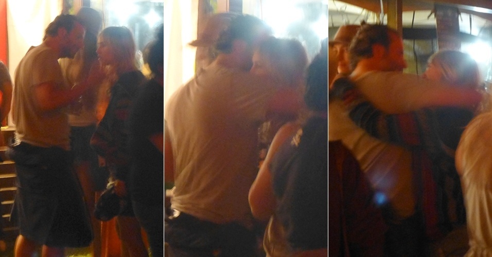 10.abr.2015 - Bradley Cooper troca abraço com a ex, a modelo Suki Waterhouse, no primeiro dia de Coachella