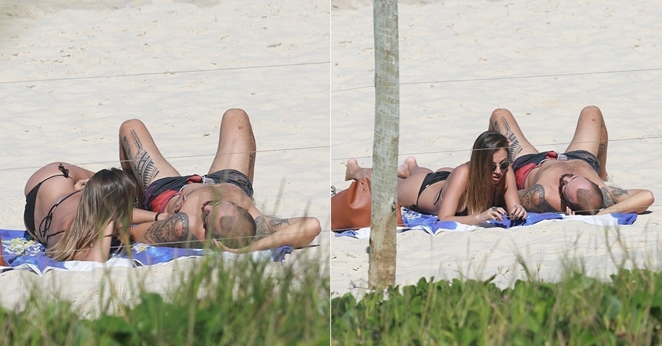 28.mai.2015 - Paulinho Vilhena tirou algumas horas de folga nesta quinta-feira (28) para curtir o sol em clima de romance na praia da Prainha, na zona oeste do Rio de Janeiro
