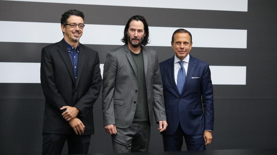 Sérgio Sá Leitão, Keanu Reeves e João Dória no Palácio dos Bandeirantes, em São Paulo - Deividi Correa/AGNews