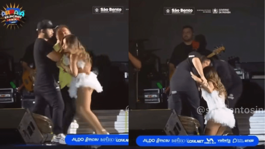 Fã agarra cantora no palco, seguranças agem e ela leva tombo na confusão Fã agarra cantora no palco, seguranças agem e ela leva tombo na confusão