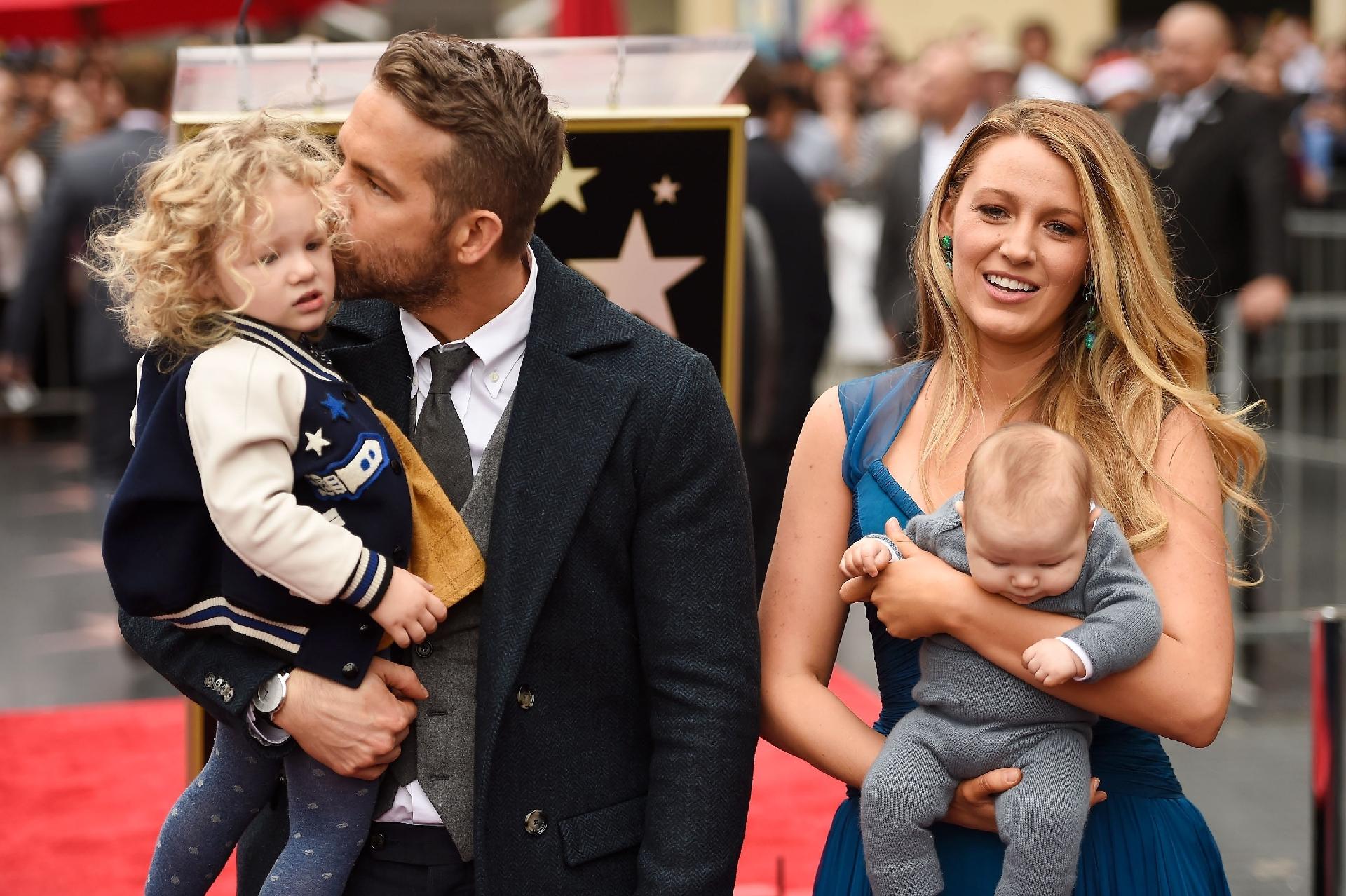 HOLLYWOOD, CA - DECEMBER 15: Actors Ryan Reynolds (L) and Blake Lively pose with their daughters as Ryan Reynolds is honored with star on the Hollywood Walk of Fame on December 15, 2016 in Hollywood, California. (Photo by Matt Winkelmeyer/Getty Images) - Getty Images