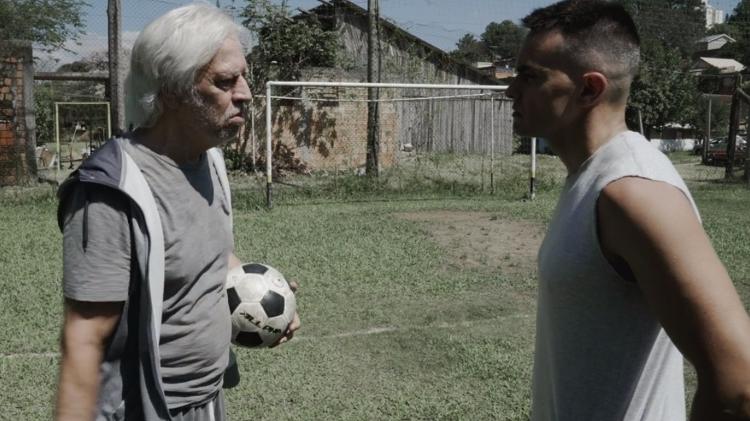 Nuno Leal Maia e Márcio Kieling em cena de Chuteira Preta - Reprodução - Reprodução
