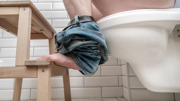 Leaving the knee above the hip line can help, but standing on the toilet is dangerous