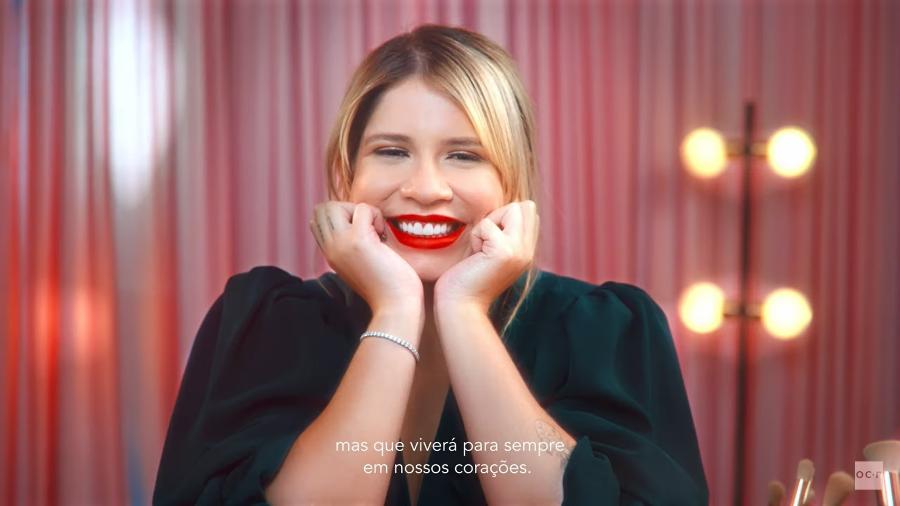 Marília Mendonça aparece no vídeo de divulgação de sua linha de maquiagens em parceria com a Océane - Reprodução/Youtube