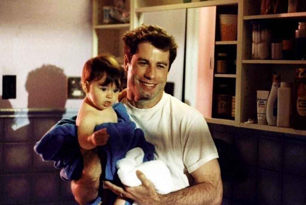 John Travolta em cena de "Olha Quem Está Falando" (1989) - Divulgação