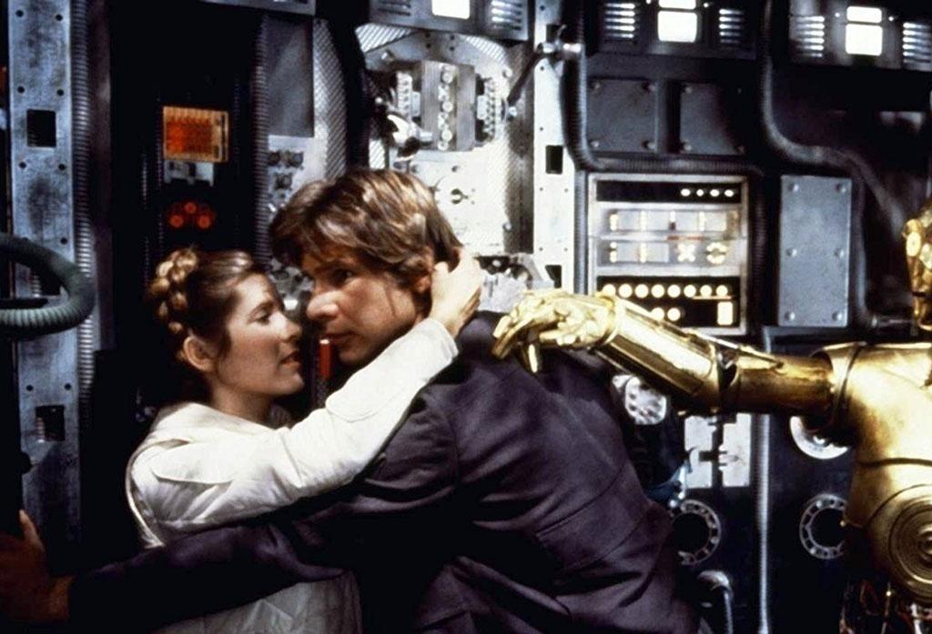 Harrison Ford e Carrie Fisher em cena de "Star Wars: O Império Contra-Ataca" (1980) - Divulgação