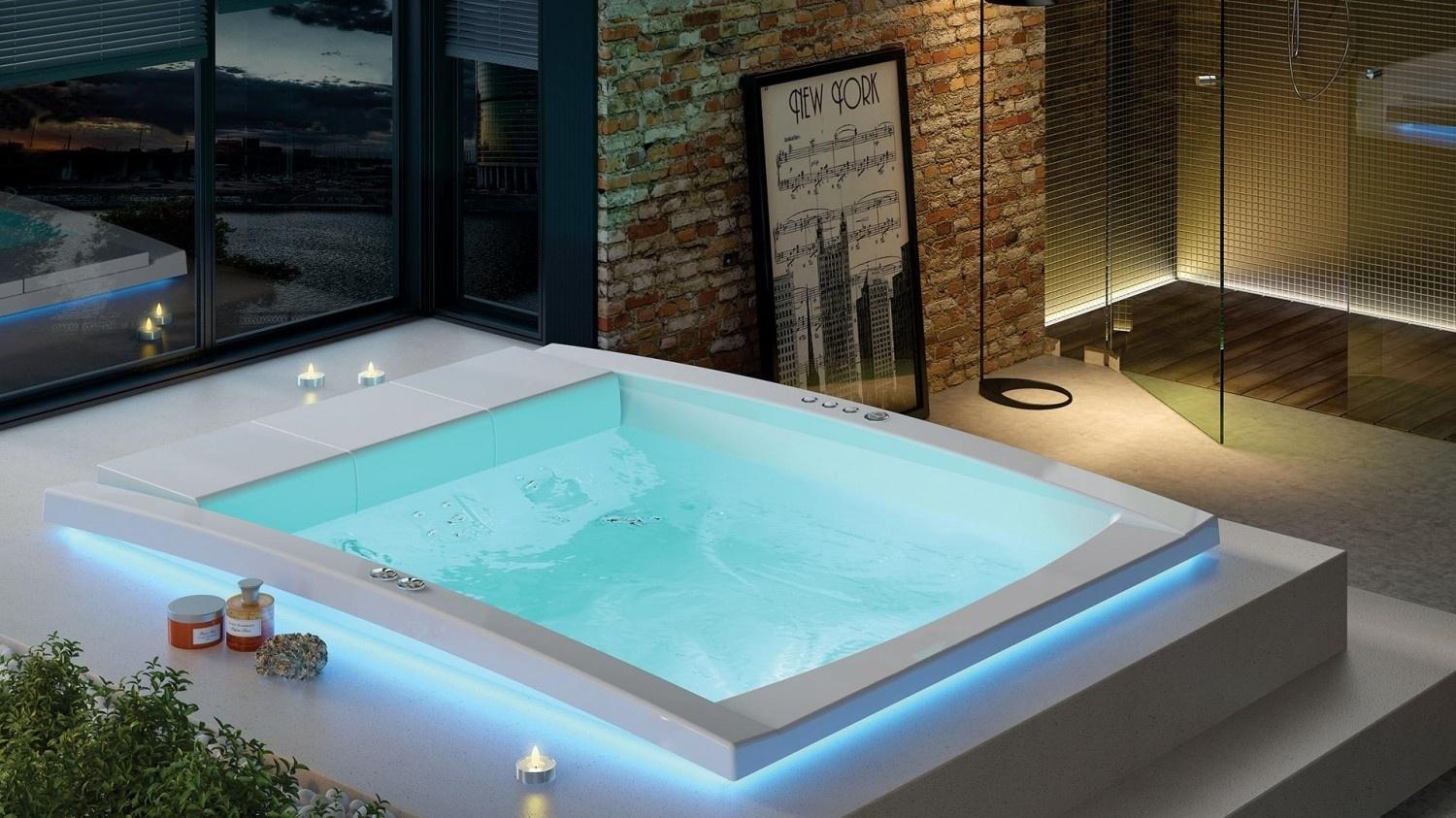 A banheira de hidromassagem da linha Concept, da Axell (www.axell.com.br), conta com 1, 2 ou 4 pontos de iluminação para cromoterapia, ideal para o relaxamento a dois, após um longo dia de trabalho. Aquecedor elétrico e efeito "borbulhas de champanhe" são algumas das características da peça - Divulgação