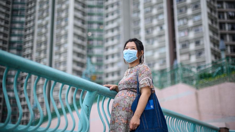 Jamie Chui, 33, reside em Hong Kong e é uma das muitas grávidas ao redor do mundo que estão confinadas em suas casas em meio à pandemia do novo coronavírus - Anthony Wallace/AFP